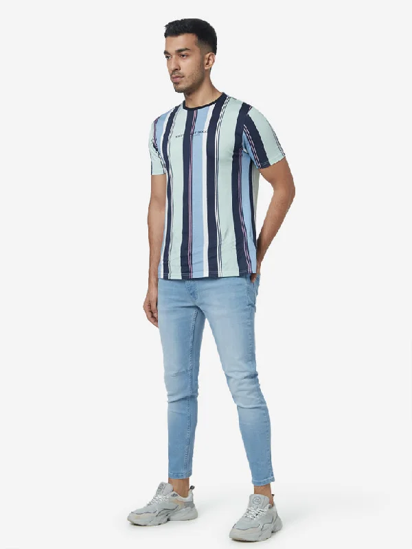Men's Distressed Jeans with Patches for a Retro and DIY - Inspired AppearanceNuon Light Blue Slim - Fit Mid - Rise Jeans