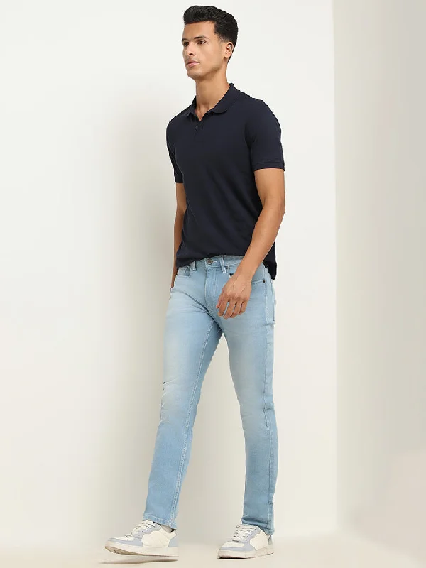 Men's Distressed Jeans with Patches for a Retro and DIY - Inspired AppearanceWES Casuals Light Blue Relaxed Fit Mid Rise Jeans