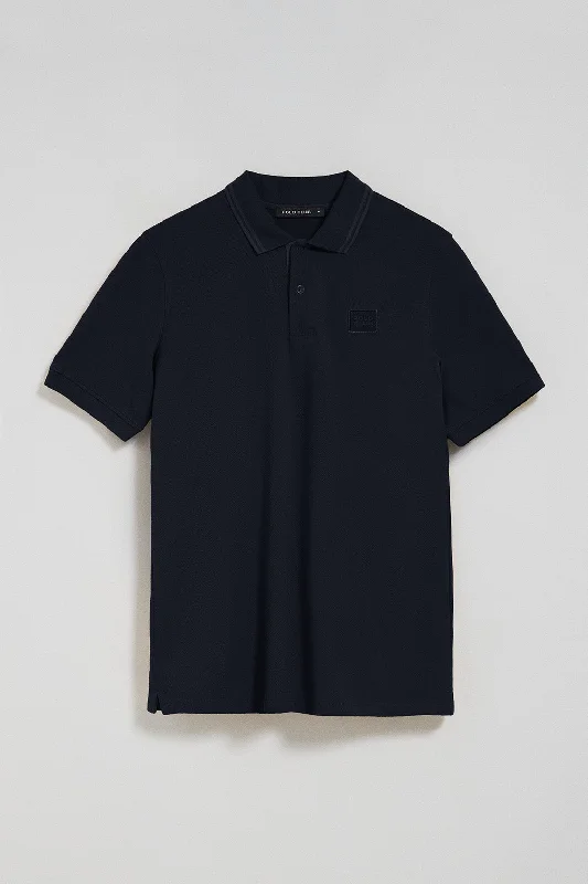 Men's color - block polo shirts with a bold fashion statementPolo de dos botones en azul marino con logo Polo Club Men's color - block polo shirts with a bold fashion statementPolo de dos botones en azul marino con logo Polo Club