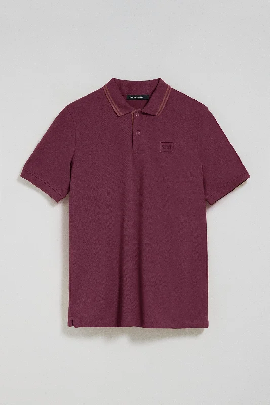 Men's reversible polo shirts with two different looksPolo de dos botones en color ciruela con logo Polo Club Men's reversible polo shirts with two different looksPolo de dos botones en color ciruela con logo Polo Club